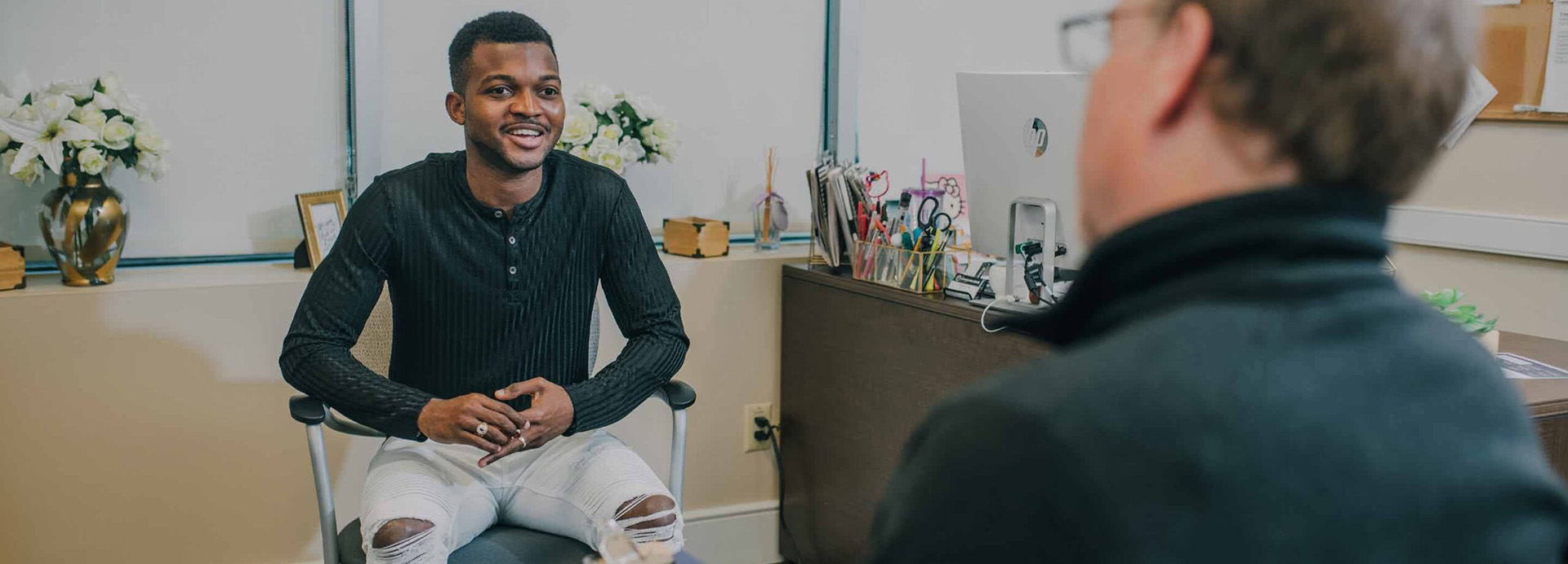 A Man Engaging in conversation at The Counseling Center Philadelphia